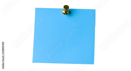 A solitary blue sticky note is affixed to a white backdrop with a brass thumbtack