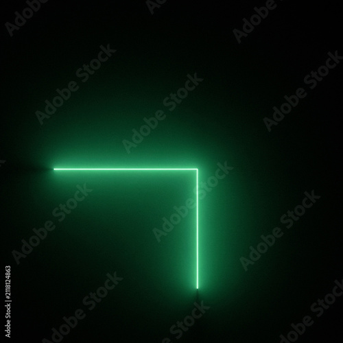 Green neon light forming a right angle against a dark background illuminated shape