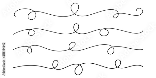 Set of hand drawn curly decorative line dividers and flourishes