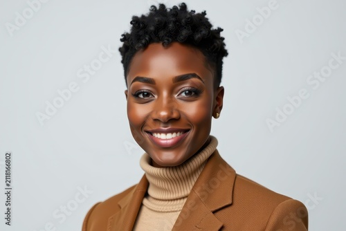 Confident woman smiles warmly at camera