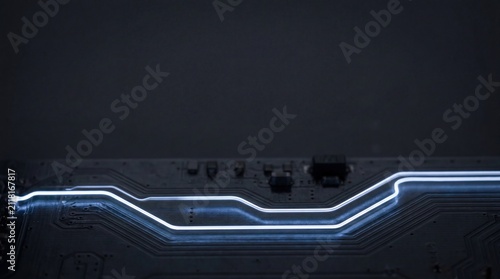 circuit board with glowing lines tracing path in dark background technology concept