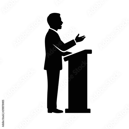 Man speaking at a podium during a presentation.