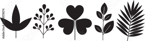 фотографія Five distinct black leaf silhouettes against a white background conceptualizing