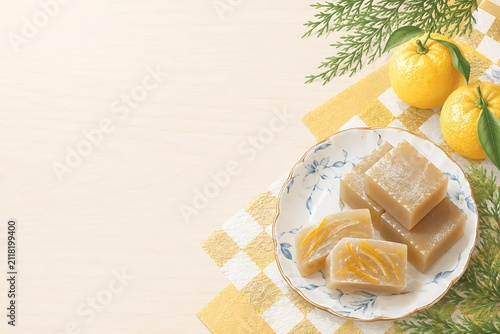 柚餅子と柚子の実の冬和菓子背景素材｜Traditional Japanese Yubeshi with Fresh Yuzu Fruits Winter Background Vector Illustration