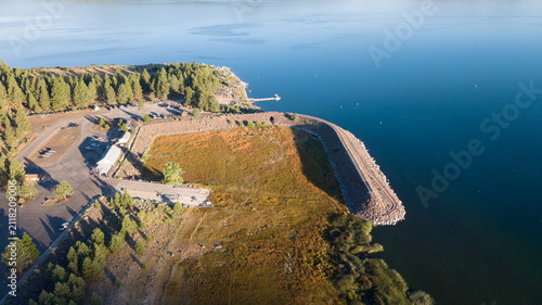 Принти на полотні Aerial view of Gallatin Marina at Eagle Lake, Lassen County, California showing dried exposed lakebed and breakwater due to prolonged drought