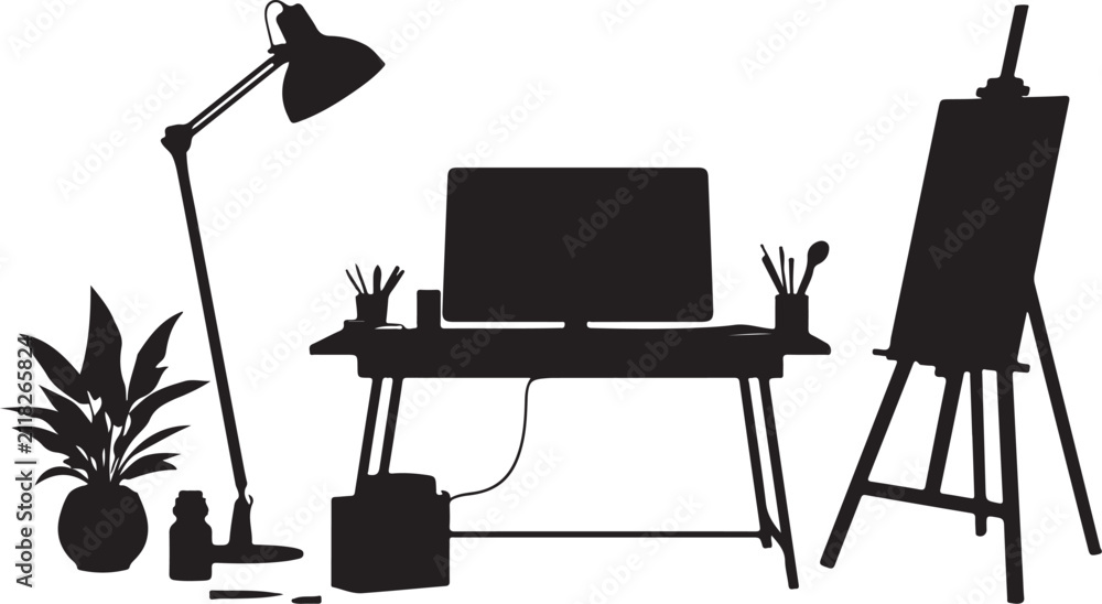 Fototapeta premium Silhouette of an artist workspace with a desk, computer monitor, floor lamp