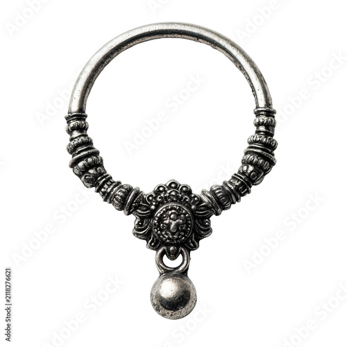 Ornate silver nose ring, featuring intricate carvings, a circular design, and a dangling spherical charm