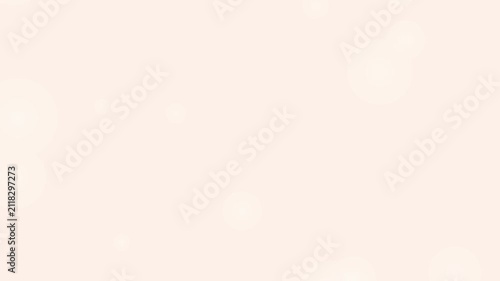 An elegant soft cream background features floating bokeh light particles.