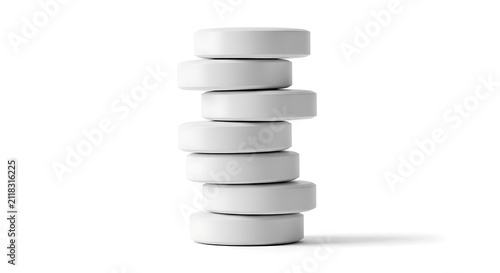 Stack of white round pills. Medical tablets isolated on a white background.