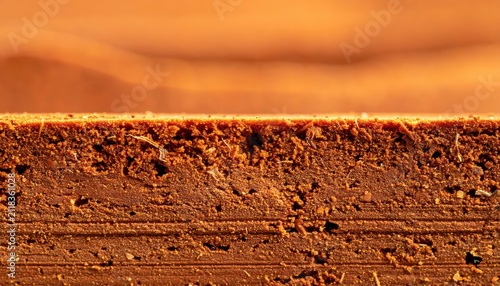Closeup Texture of Brown Orange Terracotta Surface with Grooves.