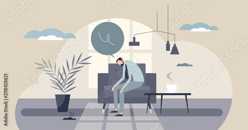 Canvas Print Languishing mood, tiny energy as a slumped man on a sofa stares past a coffee cup, symbolizing stagnation and emotional numbness