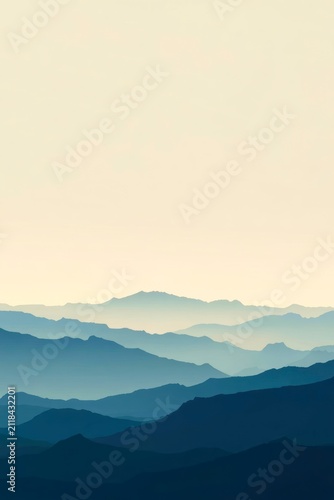 Soft dawn light washes over layered mountain ridges