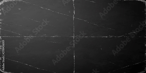 Dark black distressed paper texture with cross crease pattern background distressed abstract material aesthetic artistic backdrop darkness minimalist scratched weathered composition