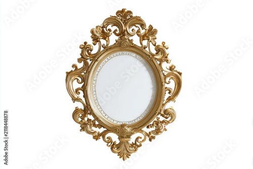 An ornate gold oval mirror with intricate baroque carvings and a detailed frame stands as a luxurious decorative piece.