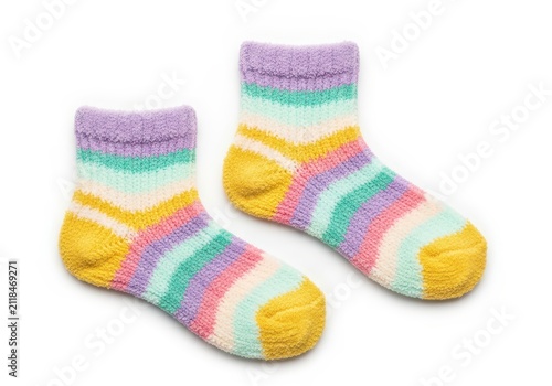 Pair of Colorful Fuzzy Striped Socks Isolated on White Background - Cozy and Warm Winter Footwear