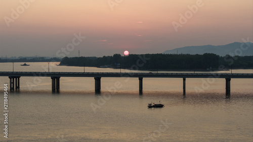 Картината върху платно Fishing Boats on Qiantang River at Sunrise, Hangzhou