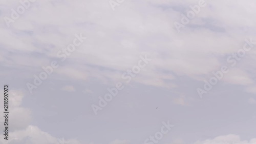 Timid pink cumulonimbus in the sky