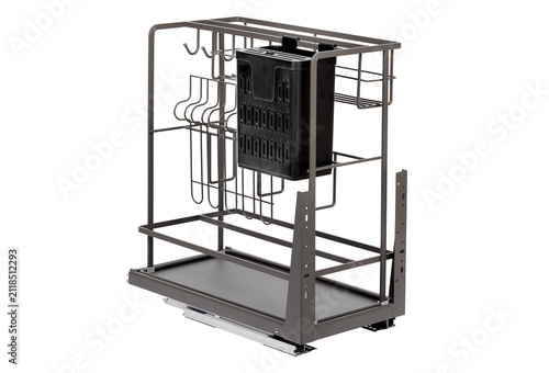 Metal kitchen storage rack for organizing utensils and accessories in home kitchen. Isolation on a white background.
