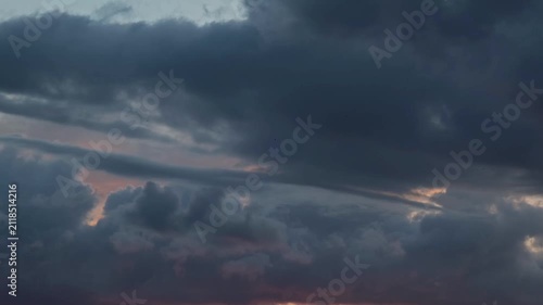 Amazing film landscape of the clouds of color pink and blue at dusk