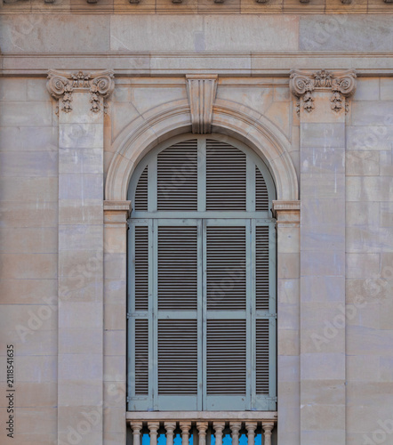 elements of architectural decorations of buildings, windows and arches on the streets in Catalonia, public places.