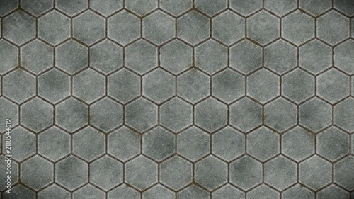 Textured grey hexagonal paving stones form an infinite loop pattern background.