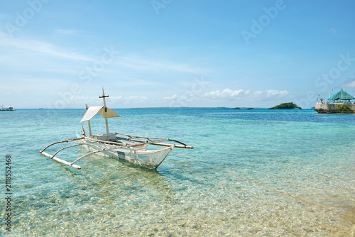 Bangka boat on the shore of Malapascua Island, Philippines.