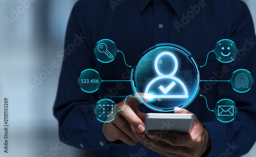 Mobile user authentication app. Multi-factor authentication using passkeys and one-time passwords. Man using smartphone to verify identity and securely login.