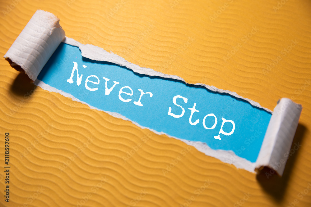 Fototapeta premium Minimalist Motivational Poster with Never Stop