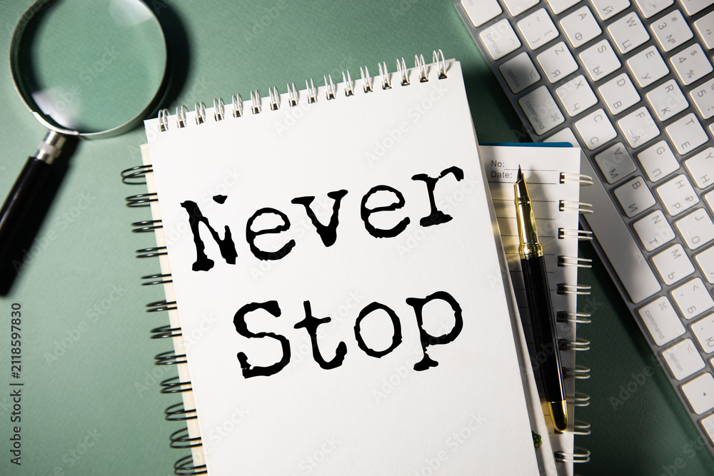 Fototapeta premium Minimalist Motivational Poster with Never Stop