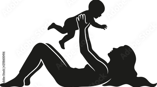 фотографія Loving mother lifting her tiny newborn baby high in air while lying down during