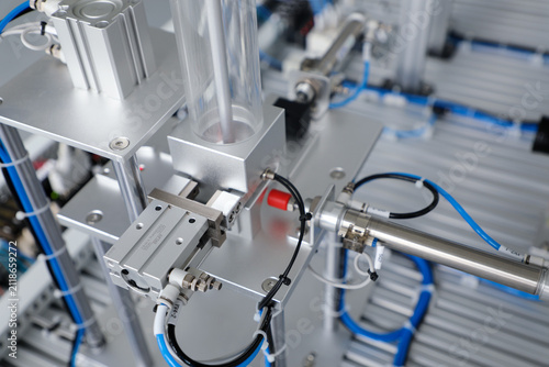 Bild auf Leinwand Close-Up of Automated Pneumatic Machinery in Modern Manufacturing