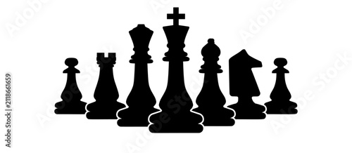 Фотография Black chess pieces silhouette on a white background representing strategy and in