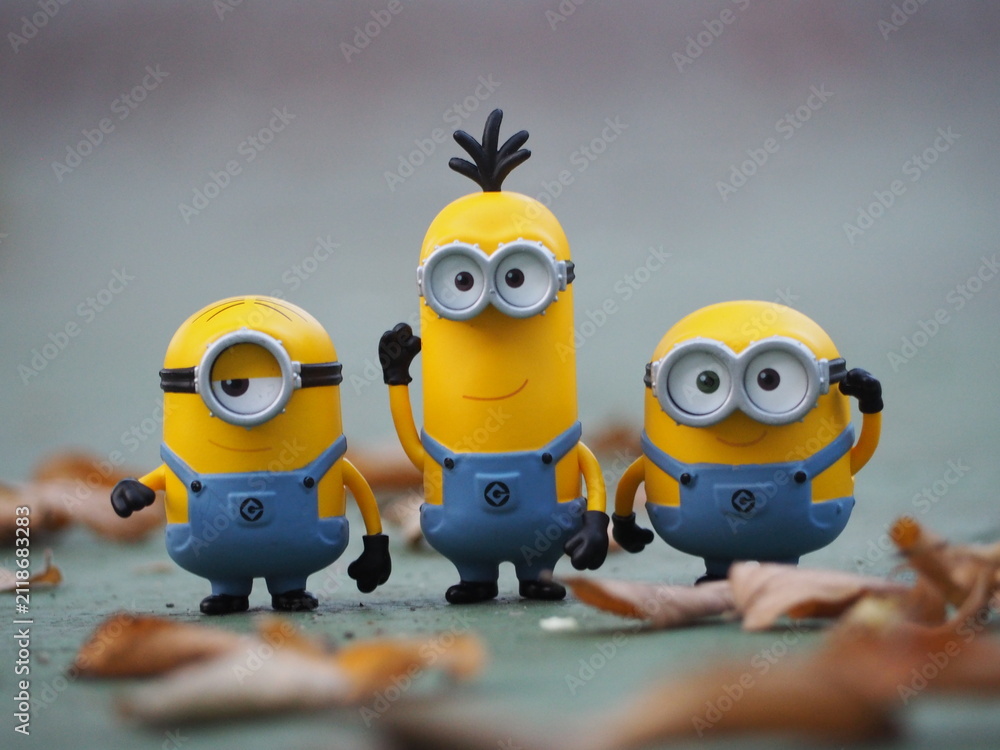 Fototapeta premium Indonesia - January 5, 2019 : Mini toy of action figure at outdoor with blurred background. Toy photography concept design. Minions character from Despicable Me cartoon film.