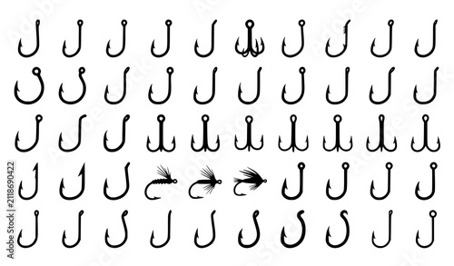 Картината върху платно Collection of various fishing hooks and fly fishing lures isolated on a white ba