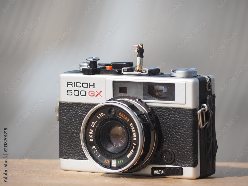 Fototapeta premium Indonesia - November 23, 2019. Mini toys and analog camera at outdoor with blurred background.