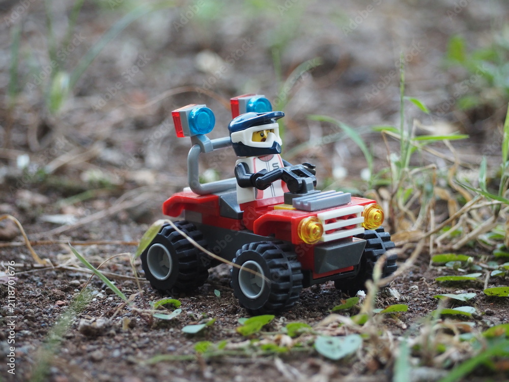 Fototapeta premium Indonesia - July 24, 2023 : Mini toy at outdoor with blurred background.