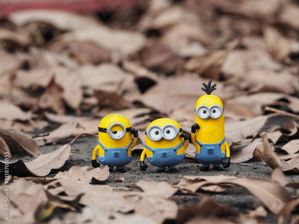 Fototapeta premium Indonesia - January 5, 2019 : Mini toy of action figure at outdoor with blurred background. Toy photography concept design. Minions character from Despicable Me cartoon film.
