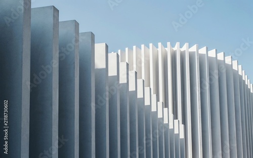 Modern architectural facade with vertical fins. Abstract building exterior with geometric lines.