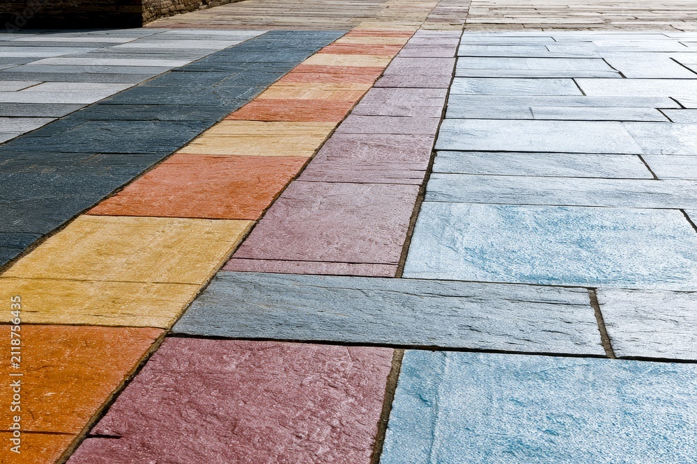 Fototapeta premium Outdoor stone paving samples arranged in gradient colors garden architectural stonework with tactile