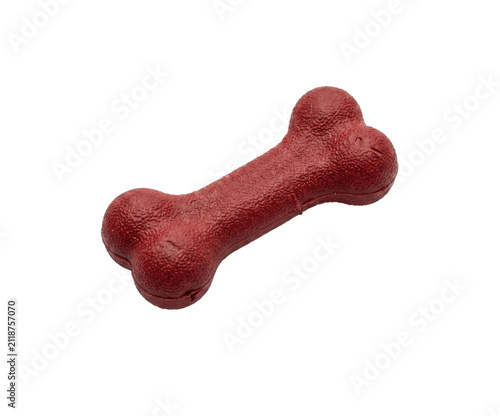 Obraz na plátne Durable red chew toy shaped like a bone for dogs