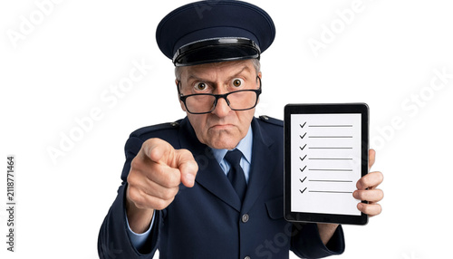 An older security guard points directly while holding a tablet displaying a checklist. The guard wears a dark uniform and cap, conveying authority and inspection.
