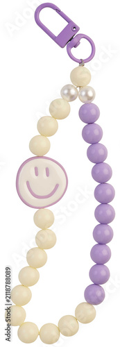 Studio shot of purple and cream beaded keychain with smiley face pendant and clip isolated on transparent background