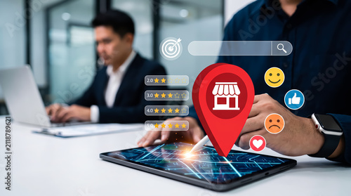 Local business marketing and seo concept, businessman using tablet with map pin, ratings, search bar and social media icons