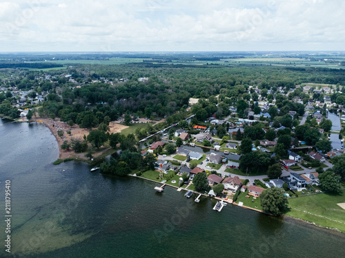 Aerial view of Zontic Beach waterfront neighborhood in Saint Zotique, Quebec, Canada on a summer day. g.