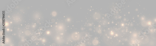 Foto Golden glitter dust shines across transparent background with warm bokeh lights and magical festive sparkle
