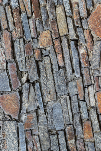 Stone tiles for finishing a low wall.