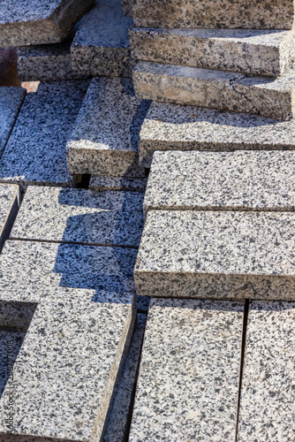 Gray granite tiles. Close-up. View from above.