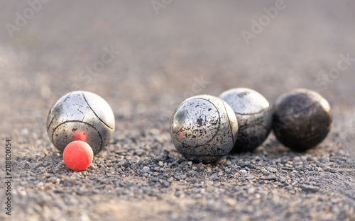 Quadro su tela traditional petanque metallic ball on gravel court,active lifestyle and outdoor