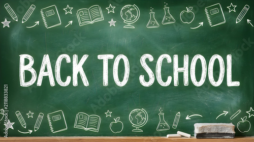 Back to school chalkboard sign with doodles. Isolated green blackboard with education art.