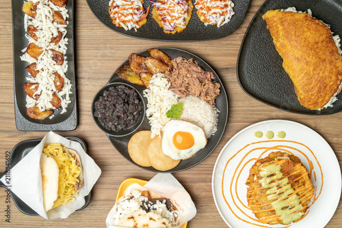 Venezuelan food spread with pabellon criollo and various dishes